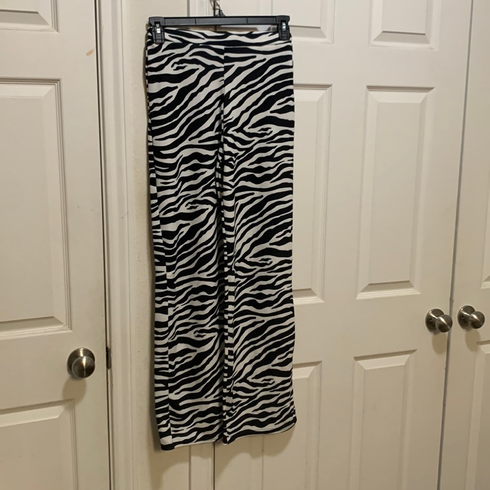 Pretty little things zebra trouser style pants. NWOT. Size 4. Waste elastic.
